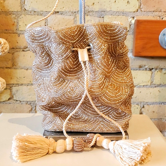 From St. Xavier Gold Beaded Evening Bucket Bag